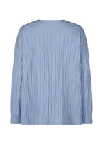 The TYPE-W 007 by A-POC ABLE ISSEY MIYAKE is a light blue long-sleeve Steam Stretch top shown from the back, with vertical pleats, relaxed fit, and subtle ribbed details on the cuffs and shoulders.