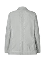 The TYPE-U 001 by A-POC ABLE ISSEY MIYAKE is a light gray, long-sleeve wrinkle-resistant jacket shown from the back, featuring subtle vertical seams and a tailored fit with no visible buttons or decorative elements.