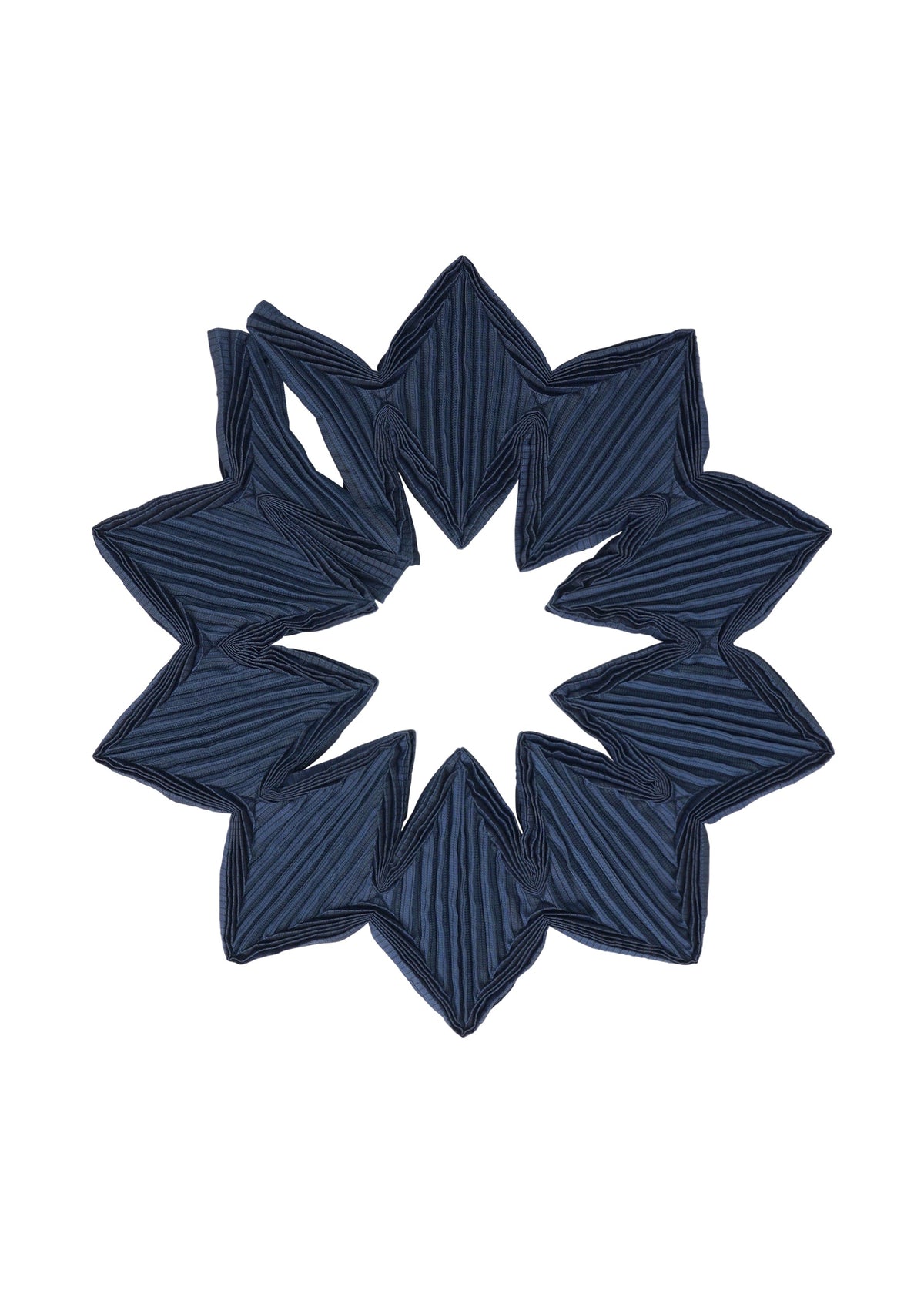 The TYPE-O STOLE 002 by A-POC ABLE ISSEY MIYAKE is displayed in a circular, star-like geometric design with pointed edges and an open center, showcasing its dark blue pleated fabric against a white background. view 3 of 15