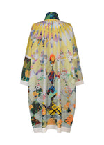A loose-fitting, long-sleeved garment featuring a geometric yellow and white diamond pattern with a central illustration of a person surrounded by colorful floral designs, this piece is inspired by contemporary art fashion. The TYPE-XII Tomokazu Matsuyama project 003 from A-POC ABLE ISSEY MIYAKE seamlessly fuses bold creativity with vibrant visual storytelling.