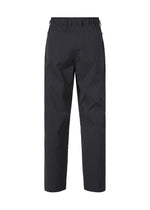 Back view of TYPE-T 001-2 by A-POC ABLE ISSEY MIYAKE: loose-fitting black pants with an elastic waistband, visible seams, lightweight 3D-textured fabric, and two functional back pockets.