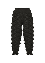TYPE-O 023 by A-POC ABLE ISSEY MIYAKE are black textured pants showcasing a geometric, three-dimensional pattern, designed with a high waist and tapered legs. Pair these bold pants with a pleated cardigan or the distinctive Steam Stretch cardigan to complete your contemporary look. The TYPE-O 023 pants are displayed on a white background. - BLACK （no.15）