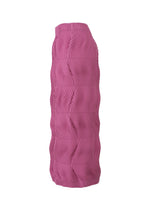 The TYPE-P 006 skirt by A-POC ABLE ISSEY MIYAKE is a pink, high-waisted pleated skirt with a scalloped textured pattern and wavy, three-dimensional pleats, made with Baked Stretch for comfort, shown on a white background.