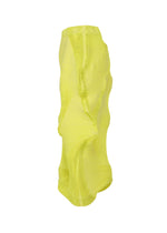 TYPE-O 022 by A-POC ABLE ISSEY MIYAKE: a long, bright yellow, semi-transparent Japanese Washi paper skirt with a wavy texture and asymmetrical silhouette, shown on a white background.