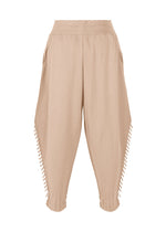 TYPE-A 003 by A-POC ABLE ISSEY MIYAKE: beige, loose harem pants made from tube-shaped fabric with a high elastic waistband, side pockets, and decorative cut-out details along the outer seams for a relaxed, stylish look.