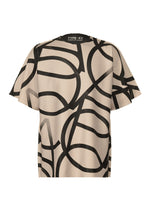 A beige, loose-fit short-sleeve shirt from A-POC ABLE ISSEY MIYAKE’s TYPE-XV SOAR NY project 002, featuring bold abstract black line patterns and the “TYPE-XV” branding inside the collar. - GRAY-HUED （no.16）