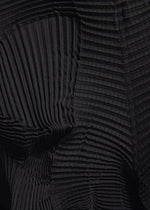 Close-up of black pleated fabric with textured, wavy ridges and geometric folds, showcasing varying depths and shadows. Crafted from recycled polyester, this unique textile is featured in the TYPE-O 003 BK pants by A-POC ABLE ISSEY MIYAKE.