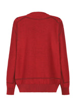 The TYPE-K 010 by A-POC ABLE ISSEY MIYAKE is a plain red long-sleeved knit top with ribbed cuffs and hem, shown from the back against a white background.