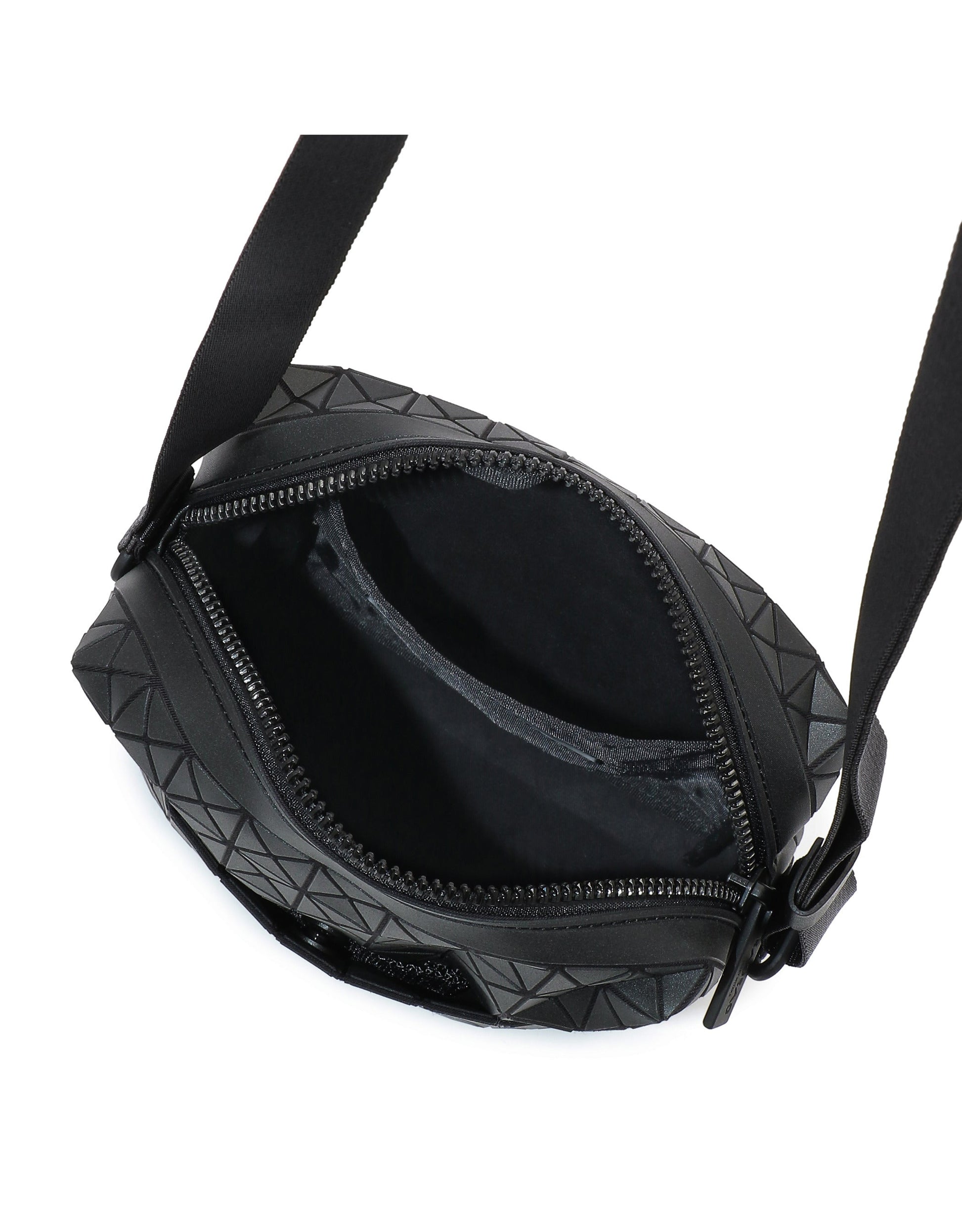 Zoomed view Top view of an open BAO BAO ISSEY MIYAKE VOYAGER crossbody travel bag with geometric patterns, showing the spacious main compartment and small inner pocket, both empty. This vertical shoulder bag features a black strap, zipper closure, and ample room for essentials such as a water bottle.