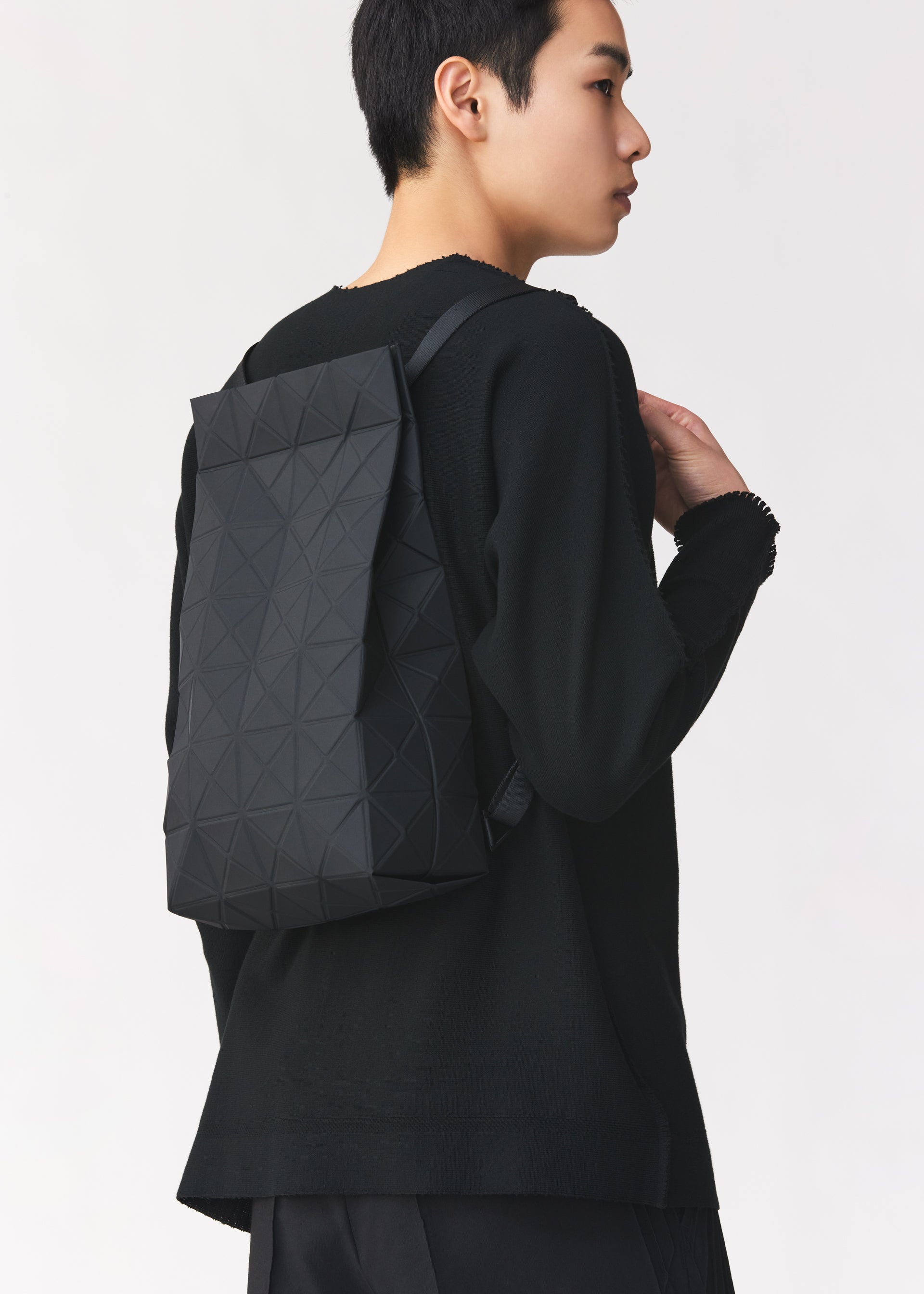 Issey Miyake purchases Backpack. Travel Bag