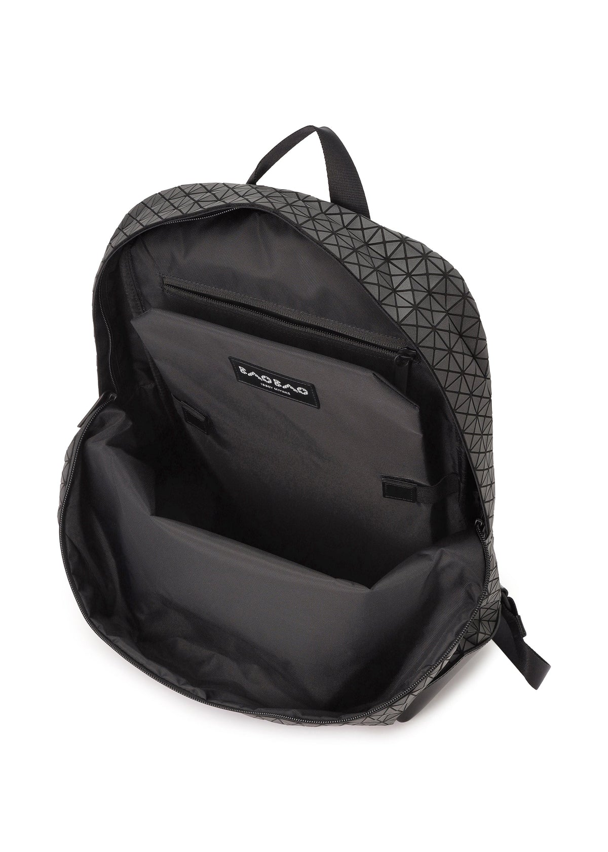 Open black LINER backpack with a geometric pattern, revealing an empty main compartment and interior zippered laptop pocket. The BAO BAO ISSEY MIYAKE brand label is visible inside. view 4 of 6