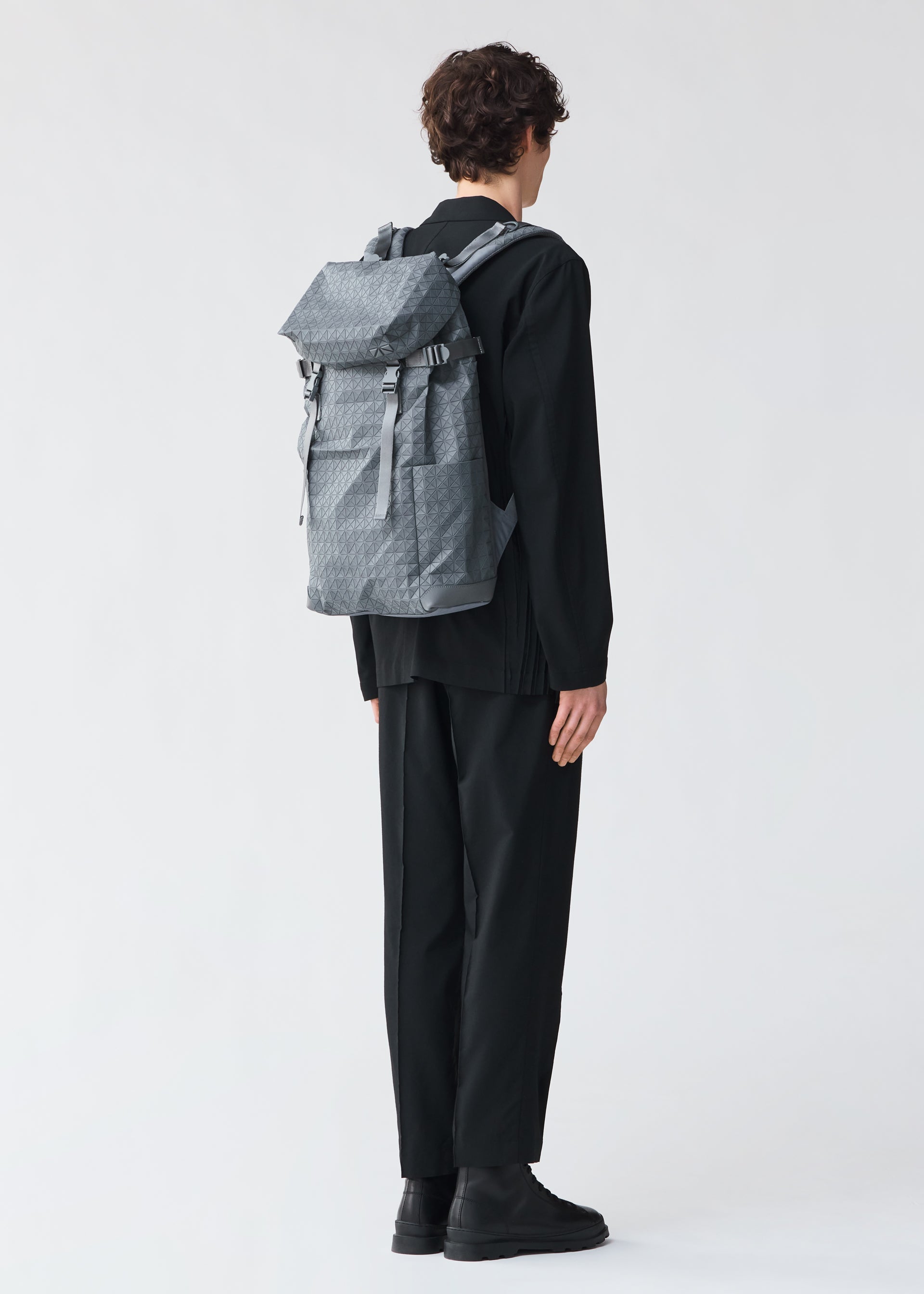 Issey Miyake purchases Backpack. Travel Bag