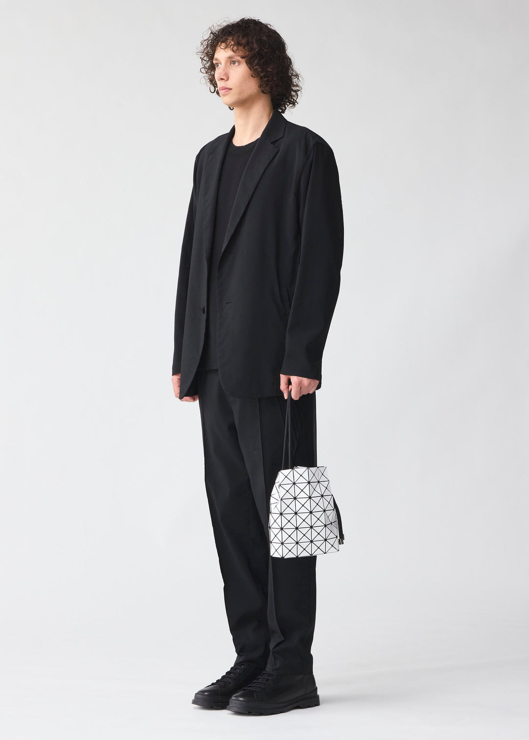 WRING SHOULDER BAG | The official ISSEY MIYAKE ONLINE STORE | ISSEY MIYAKE  USA