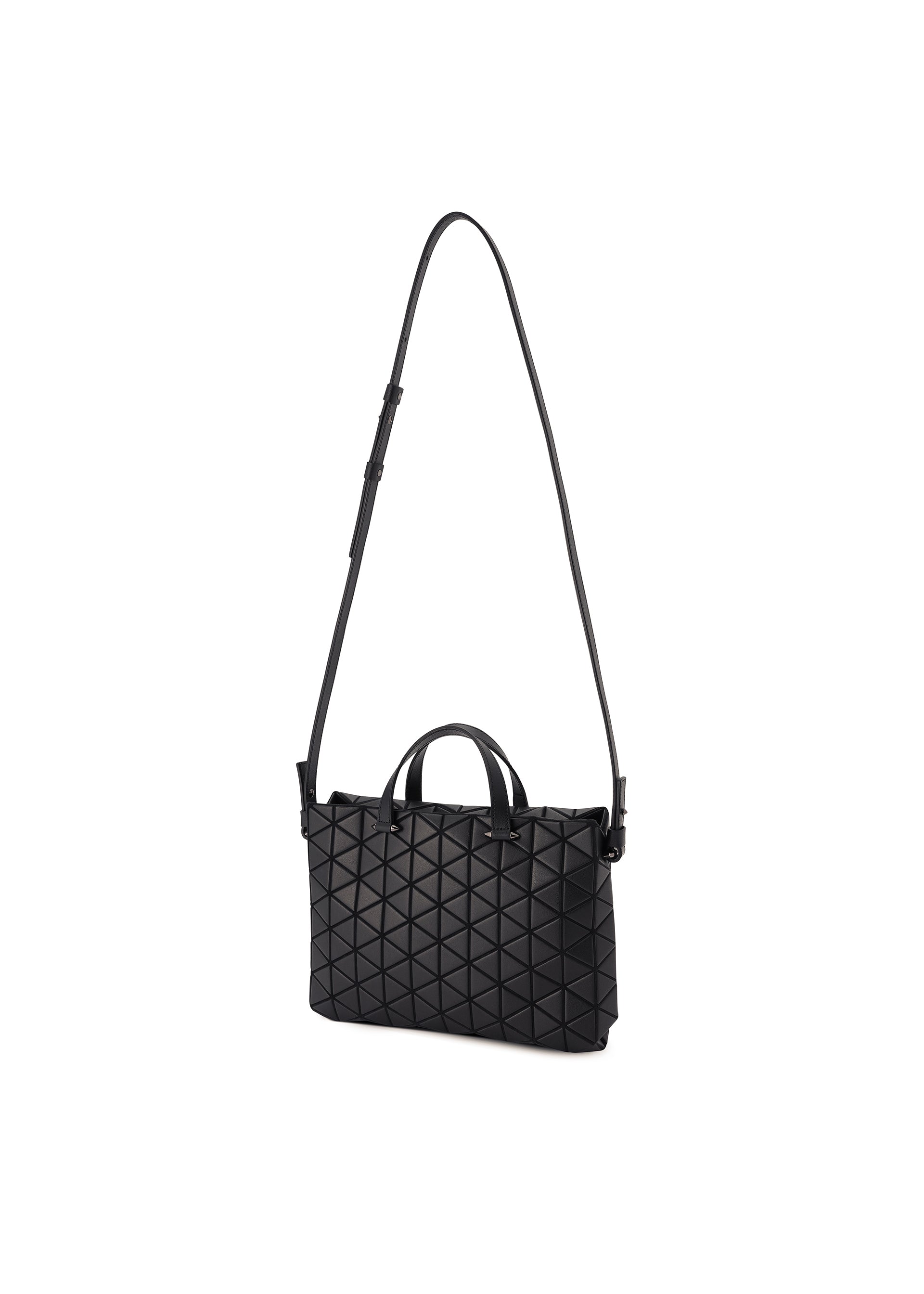 Zoomed view The TONNEAU MATTE by BAO BAO ISSEY MIYAKE is a black, barrel-shaped shoulder bag with a leather-like geometric pattern, adjustable long strap, and two short handles, shown against a plain white background.