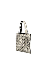 A geometric-patterned shoulder bag from the BAO BAO ISSEY MIYAKE PLATINUM series, with metallic triangles and two handles—one black, one white—displayed against a plain white background.