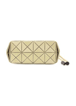 The WRING ONE-TONE by BAO BAO ISSEY MIYAKE is a gold rectangular clutch with a pyramid-textured geometric pattern and wrist strap featuring two black circular accents, easily converting from clutch to shoulder bag for versatile styling.