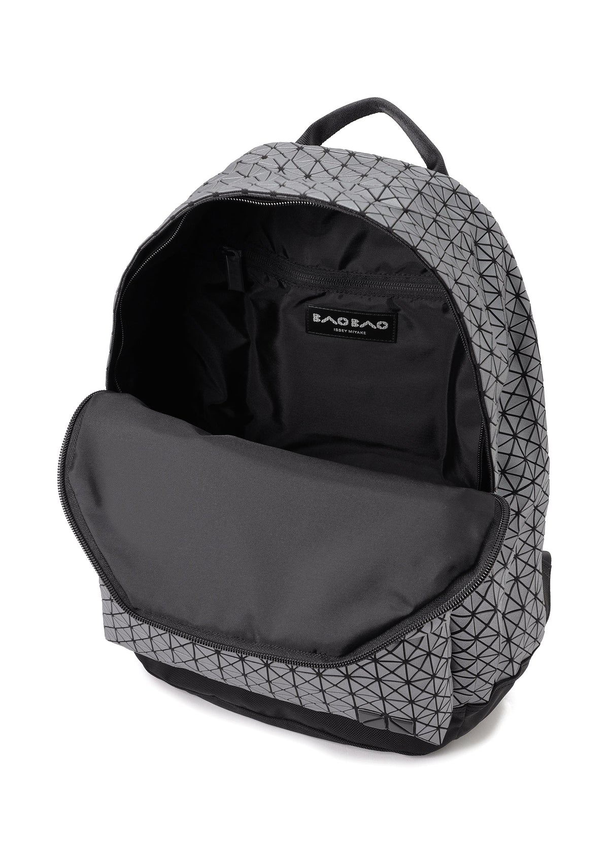 The DAYPACK REFLECTOR by BAO BAO ISSEY MIYAKE is a geometric-patterned gray and black unisex backpack with its main zipper open, showing a spacious interior and iconic branding. view 4 of 7