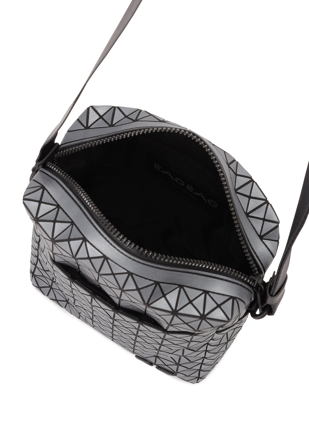 The VOYAGER REFLECTOR by BAO BAO ISSEY MIYAKE is a small, black and silver geometric crossbody with an open zipper showing its sleek black interior and visible logo, reflecting the modern metallic style of the brand's tote bags. view 3 of 7