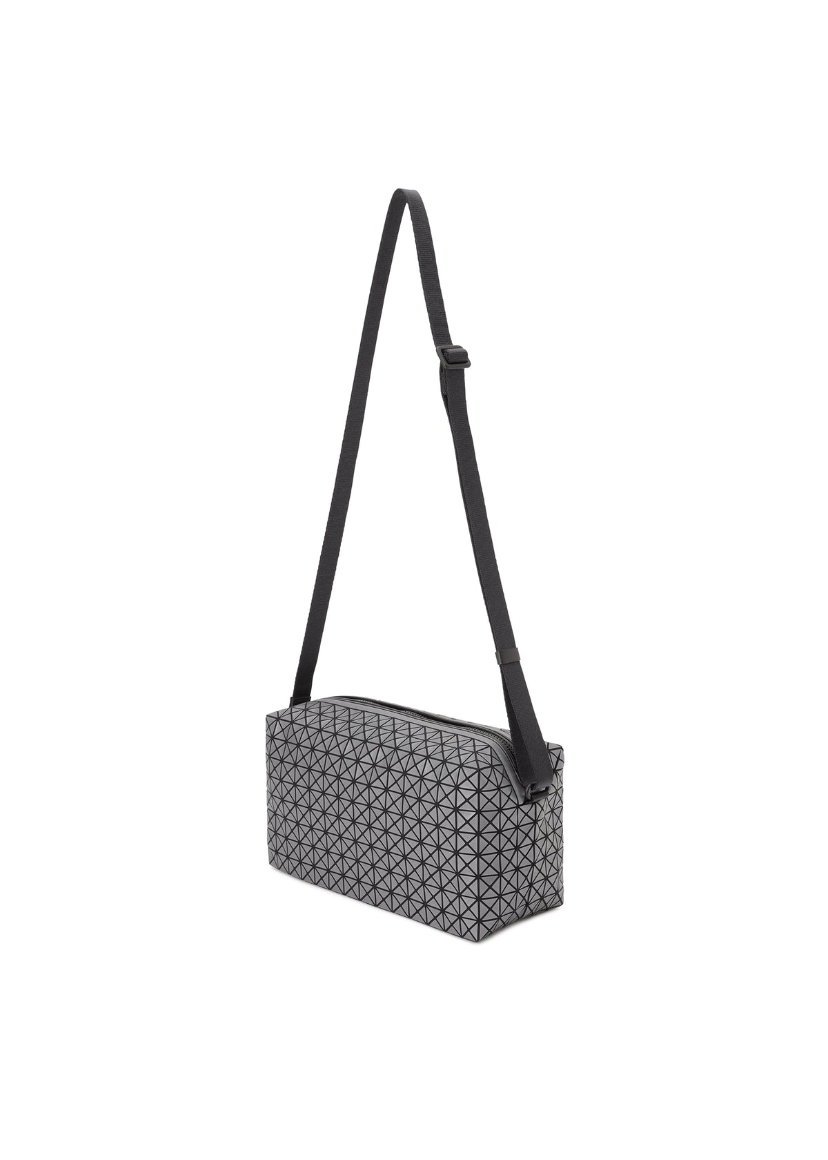 The SADDLE BAG REFLECTOR by BAO BAO ISSEY MIYAKE is a rectangular gray shoulder bag with a geometric triangular pattern, long adjustable black strap, and zippered inner pocket, shown on a plain white background. view 2 of 8