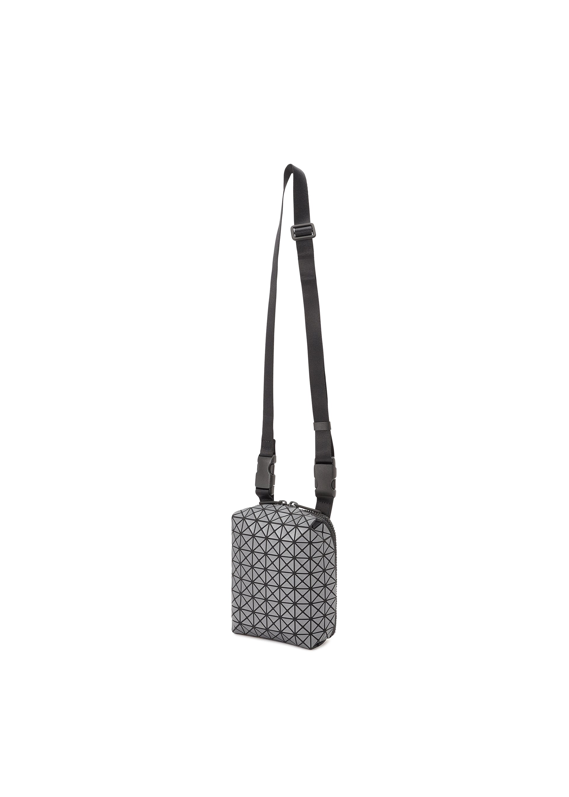 Zoomed view The BAO BAO ISSEY MIYAKE BEETLE REFLECTOR is a small, rectangular crossbody bag with reflective material, an adjustable black strap, and a geometric gray and black triangular grid pattern on the front.