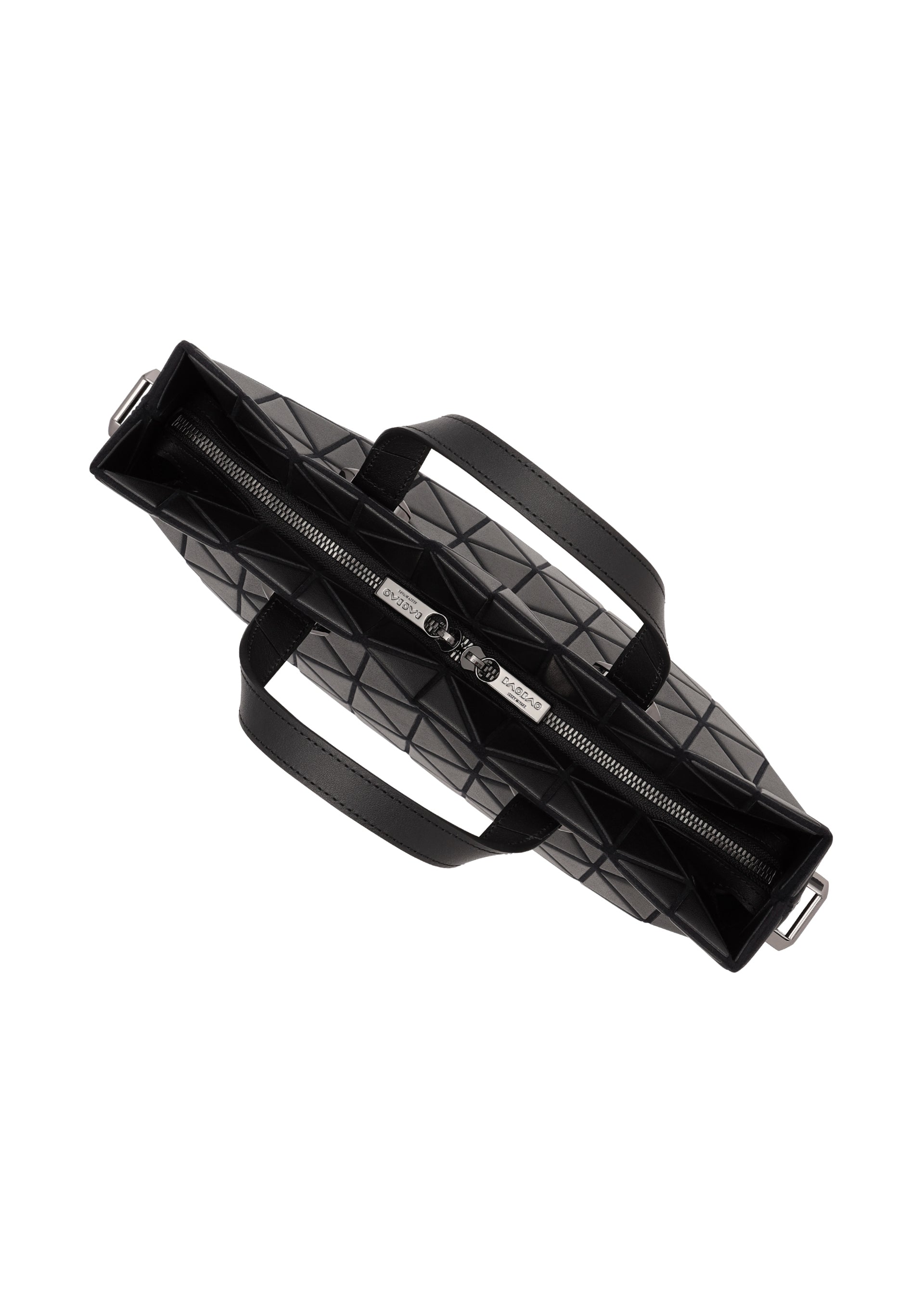 Zoomed view A top view of the BAO BAO ISSEY MIYAKE TONNEAU MATTE: a black, structured, A4-sized handbag with a geometric matte pattern, two handles, and a central silver zipper for a modern look.