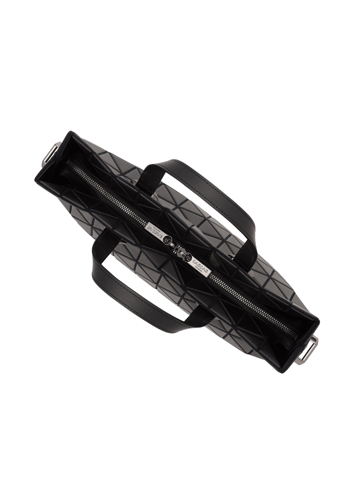 The TONNEAU MATTE by BAO BAO ISSEY MIYAKE is a black barrel-shaped handbag with a geometric pattern, two handles, and a central zippered compartment, shown from above. view 4 of 6