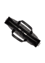 The TONNEAU MATTE by BAO BAO ISSEY MIYAKE is a black barrel-shaped handbag with a geometric pattern, two handles, and a central zippered compartment, shown from above.