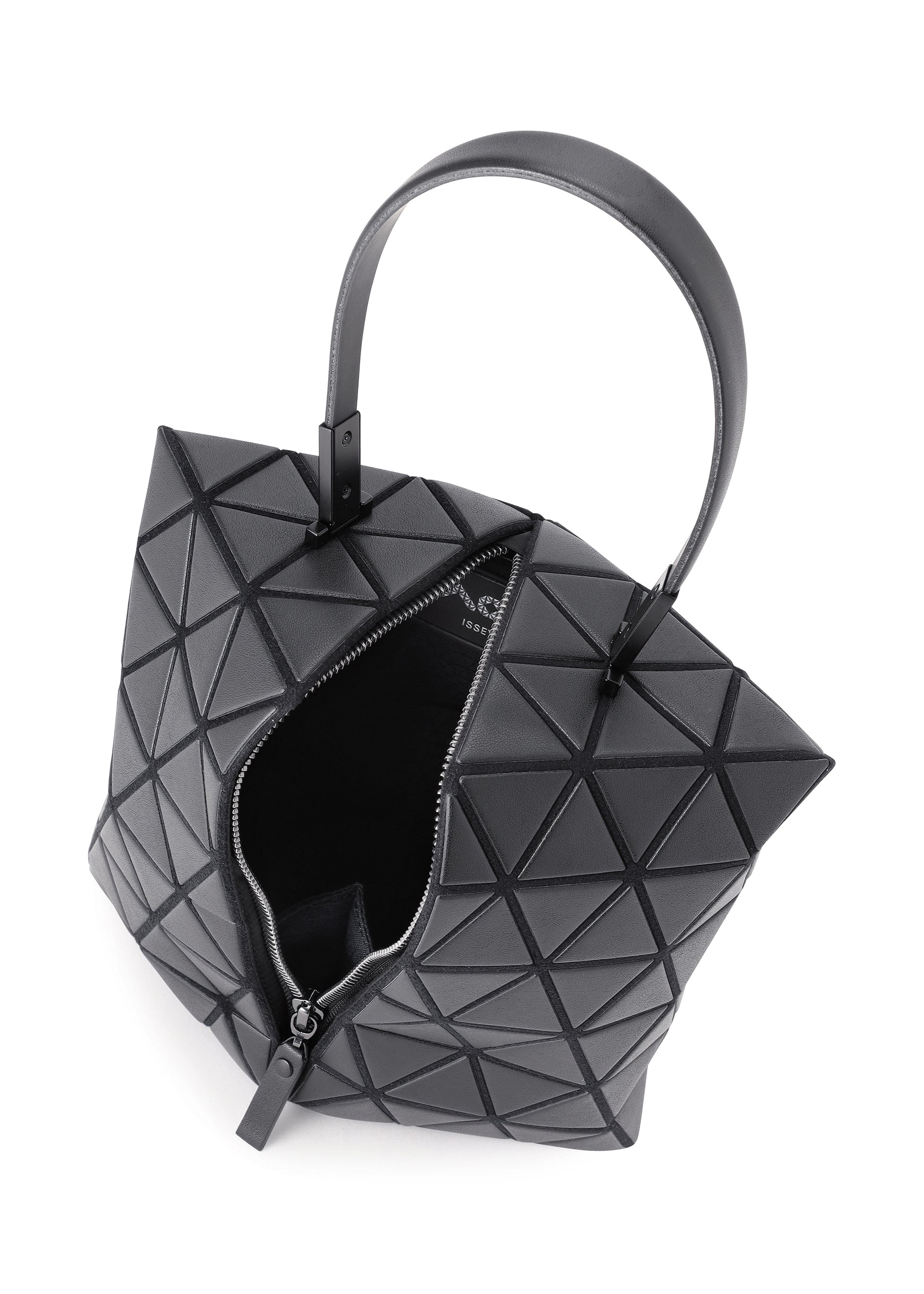Zoomed view The TORSO handbag by BAO BAO ISSEY MIYAKE features a geometric black equilateral triangle design with raised shapes, a single handle, and a partially open zipper that reveals the interior for a modern, stylish look.