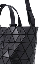 Close-up of the BAO BAO ISSEY MIYAKE CRYSTAL GLOSS handbag in black cowhide leather, showcasing a geometric triangular design with both a short handle and an adjustable long strap.