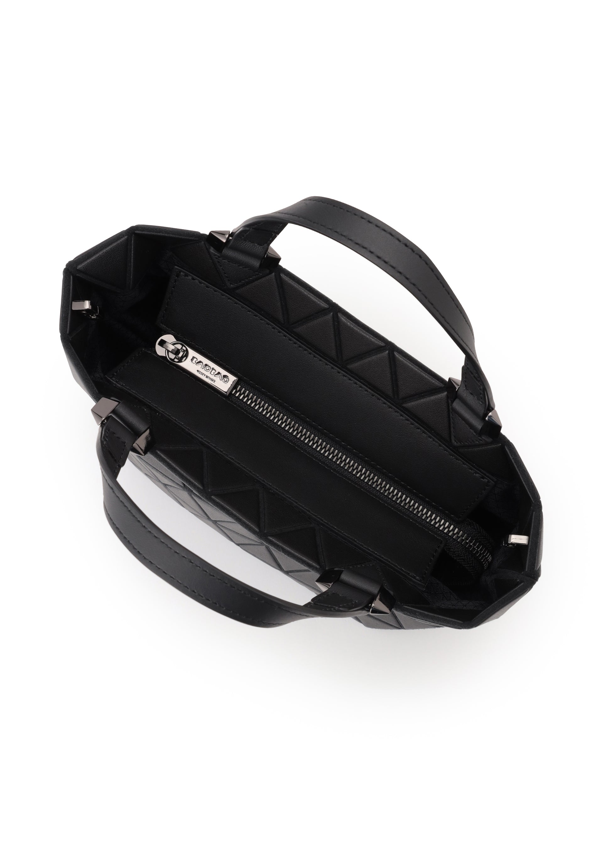 Zoomed view Top view of an open BAO BAO ISSEY MIYAKE CRYSTAL MATTE black quilted mini handbag with leather straps, double handles, zippered interior pocket, and a visible metal brand tag on the lining.