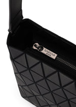 Close-up of a black CRYSTAL MATTE shoulder bag by BAO BAO ISSEY MIYAKE, with geometric pattern, leather straps, and a silver zipper. The matte finish highlights its modern design, while the zipper pull showcases the brand engraving.