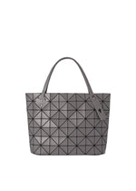 The BAO BAO ISSEY MIYAKE ROCK MATTE gray tote features a geometric triangular pattern, two handles, and a gusseted bottom for extra space—ideal for carrying your 13-inch laptop—shown against a white background. - CHARCOAL GRAY (no.14)