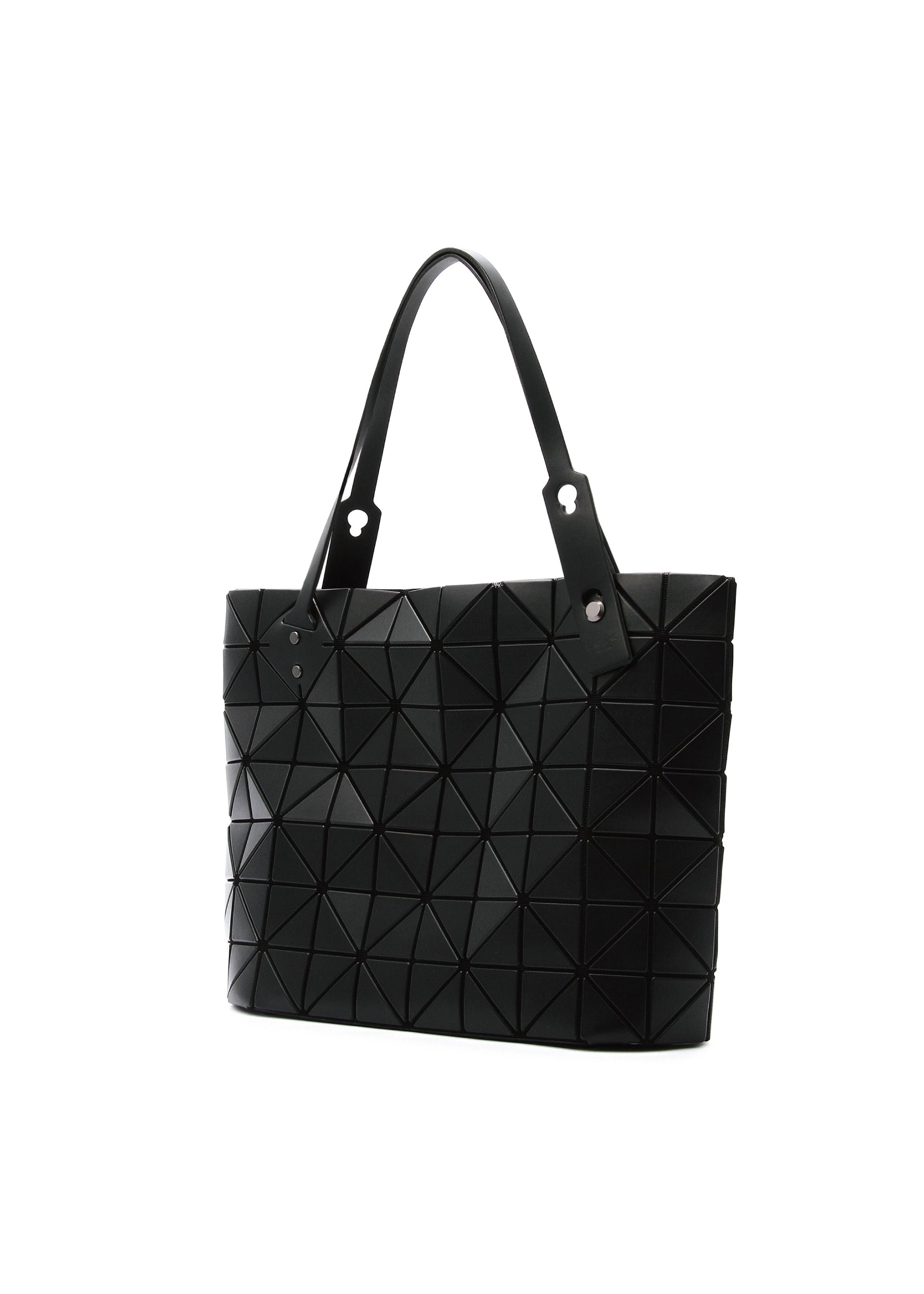 Zoomed view The BAO BAO ISSEY MIYAKE ROCK MATTE is a black tote bag with geometric triangular patterns, two matching handles, and a gusseted bottom for extra space—ideal for carrying your 13-inch laptop. Shown on a white background.