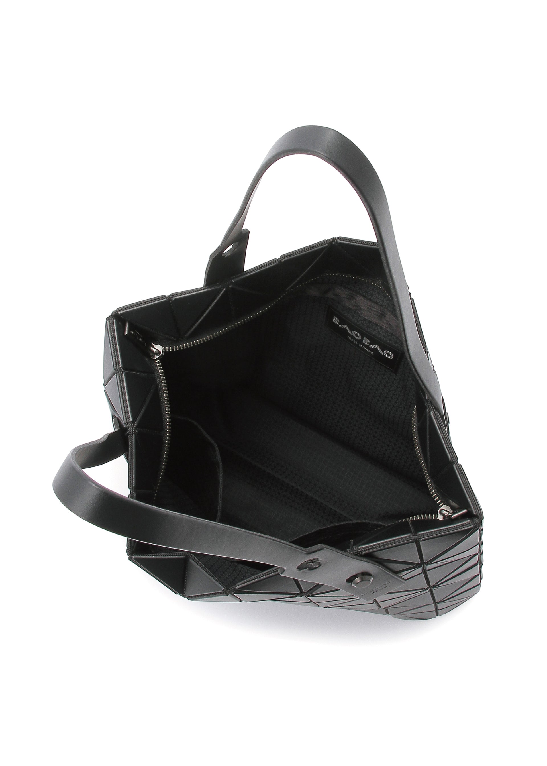 Zoomed view The ROCK MATTE by BAO BAO ISSEY MIYAKE is a black geometric handbag with two handles, a gusseted bottom, zippered inner pocket, and modern triangular design. It fits essentials and up to a 13-inch laptop.