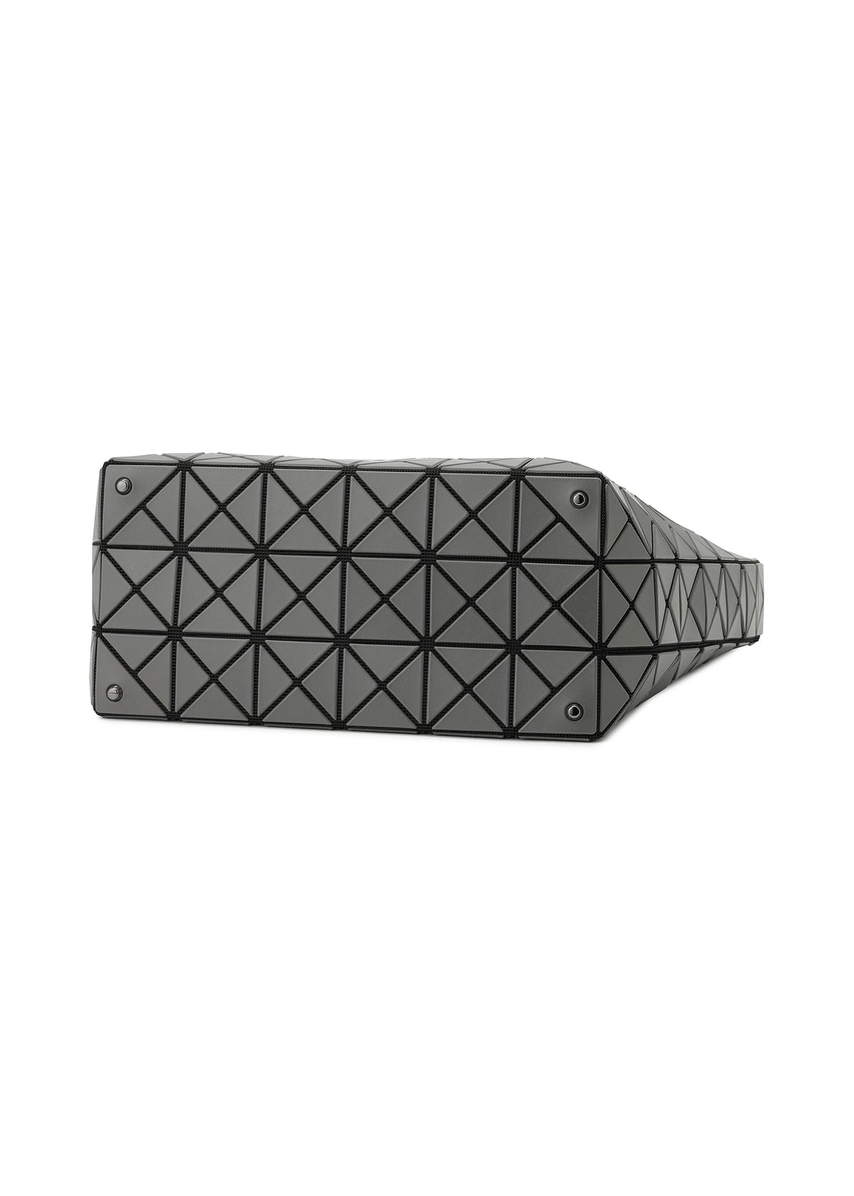 The image shows the base of the VALLEY handbag by BAO BAO ISSEY MIYAKE, a black rectangular design with a shiny geometric triangular grid and small metal feet at each corner for stability. view 5 of 8