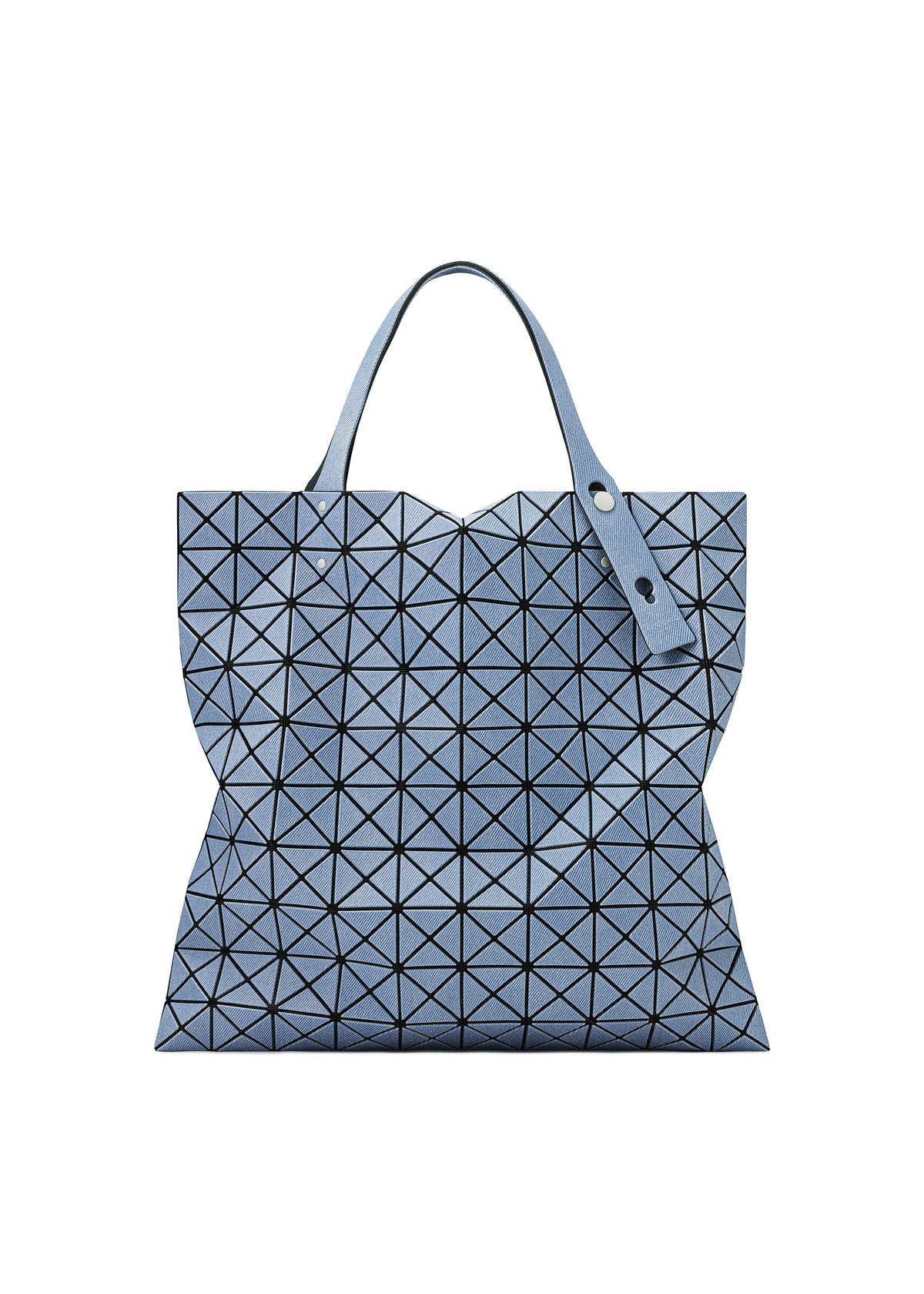 The PRISM DENIM tote by BAO BAO ISSEY MIYAKE features a geometric blue triangular pattern, denim fabric, two handles, a modern structured shape, and a zippered interior pocket. view 2 of 7