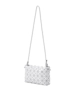 The LOOP ONE-TONE cross-body bag by BAO BAO ISSEY MIYAKE features a white geometric triangular pattern, an adjustable strap, and is photographed against a plain white background.