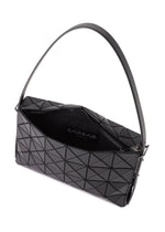 The OBLONG by BAO BAO ISSEY MIYAKE is a black geometric shoulder bag with triangular patterns, a wide strap, and a partially open zipper showing its patterned interior with visible logo text inside.