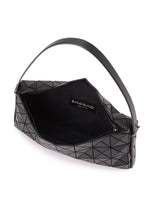 The OBLONG by BAO BAO ISSEY MIYAKE is a geometric black shoulder bag with a single strap and triangular pattern, featuring a fabric-lined interior and the brand’s label.