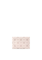 The LUCENT W COLOR by BAO BAO ISSEY MIYAKE is a small, rectangular blush pink pouch clutch with a geometric triangular pattern, displayed against a plain white background.