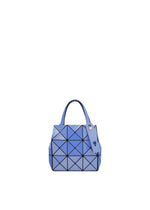 The CARAT by BAO BAO ISSEY MIYAKE is a small blue geometric metallic handbag with black grid lines, two handles, an inner pocket, and a tag attached, shown against a plain white background. - BLUE (no.72)