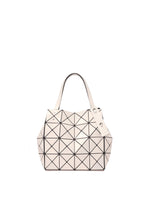 The CARAT tote by BAO BAO ISSEY MIYAKE features a glossy off-white surface with black intersecting lines in triangular patterns, two handles, a structured modern design, and a handy zippered pocket for extra functionality. - LT.BEIGE (no.42)
