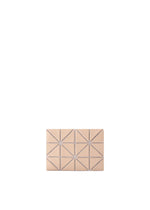 The CARD CASE W COLOR by BAO BAO ISSEY MIYAKE features a beige two-tone geometric triangular pattern with small metallic studs, displayed on a white background. - BEIGE×LIGHT BEIGE （no.49）