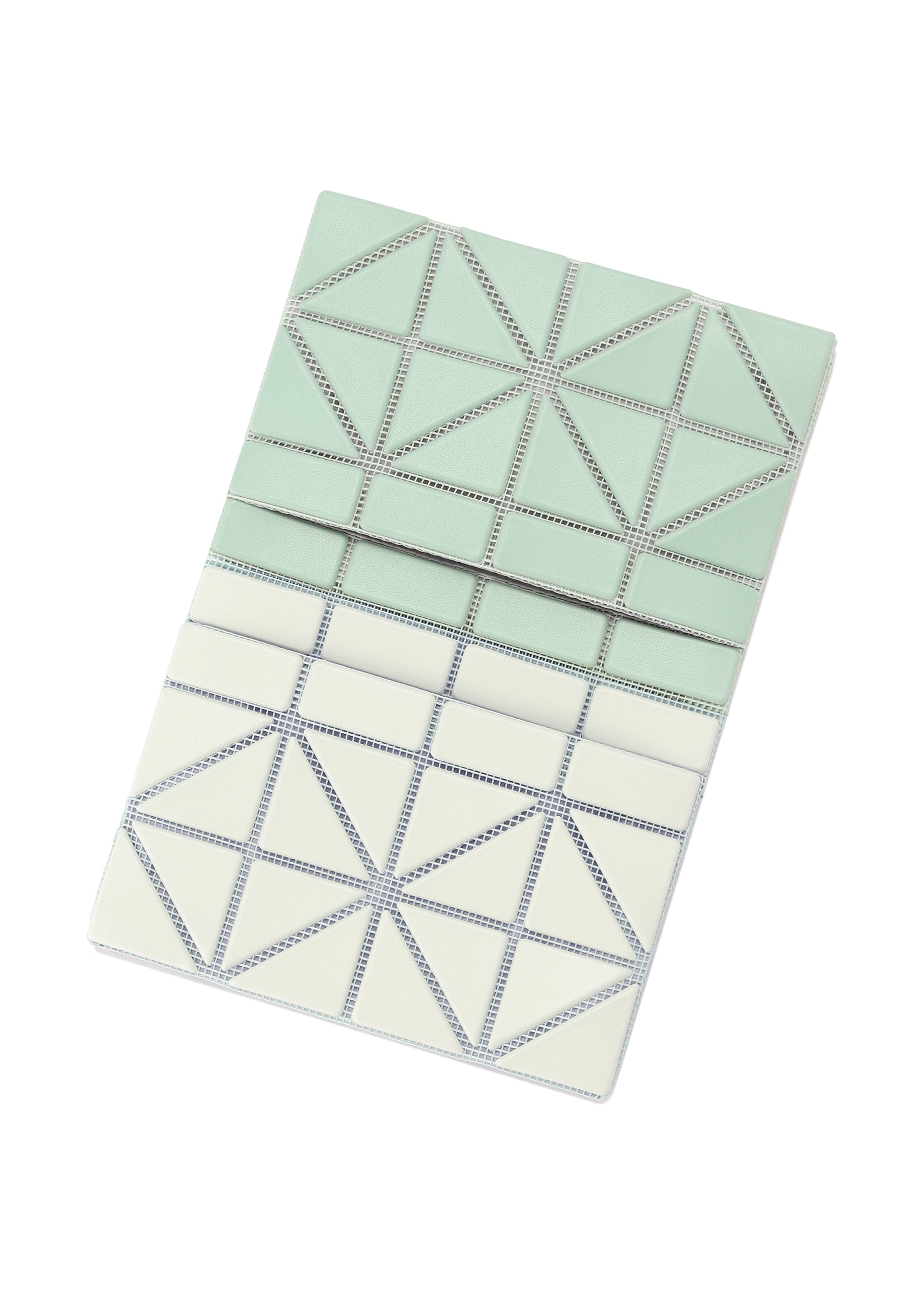 Zoomed view The CARD CASE W COLOR by BAO BAO ISSEY MIYAKE features a geometric two-tone design with light green and white triangles divided by metallic lines, shown against a white background.