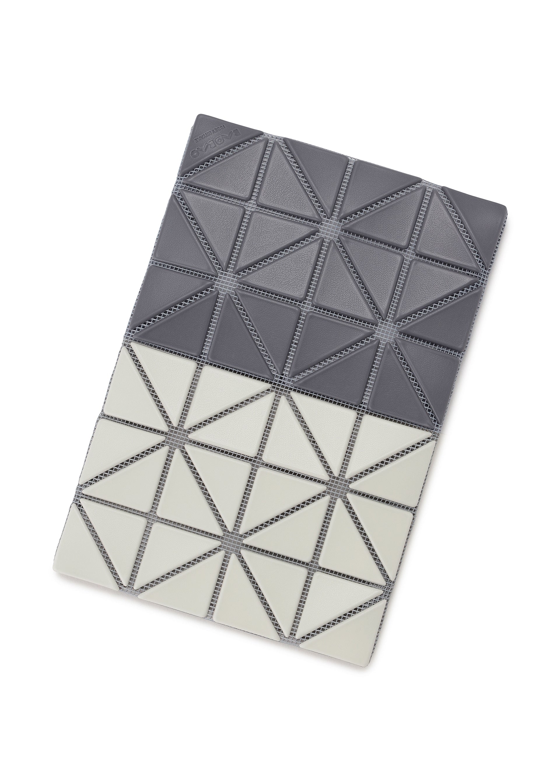 Zoomed view The CARD CASE W COLOR by BAO BAO ISSEY MIYAKE features a rectangular design with a two-tone geometric triangle pattern—dark gray on top, light gray on bottom—highlighted by visible stitched outlines.