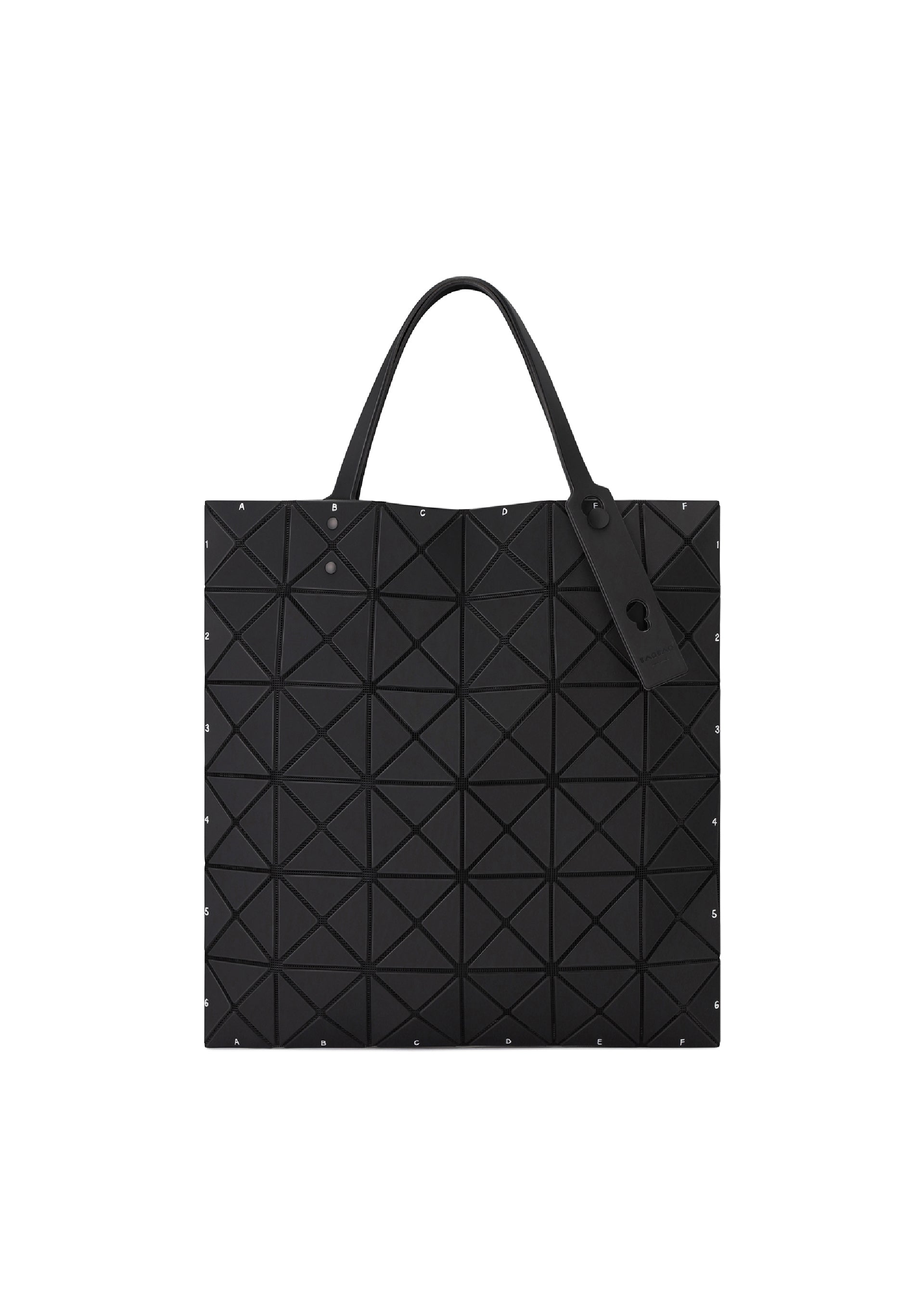 Zoomed view The BAO BAO ISSEY MIYAKE MAP tote bag features black geometric triangles, dual handles, and a decorative tag on one handle.