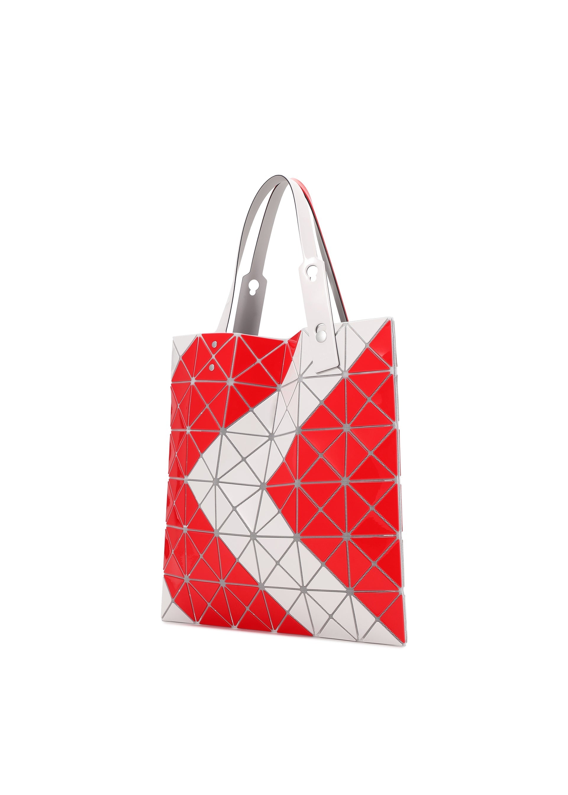 Zoomed view The SIGN tote by BAO BAO ISSEY MIYAKE features red and white triangular panels in a bold zigzag pattern with silver accents and two gray handles. It's spacious enough for A4 documents or a 13-inch laptop.