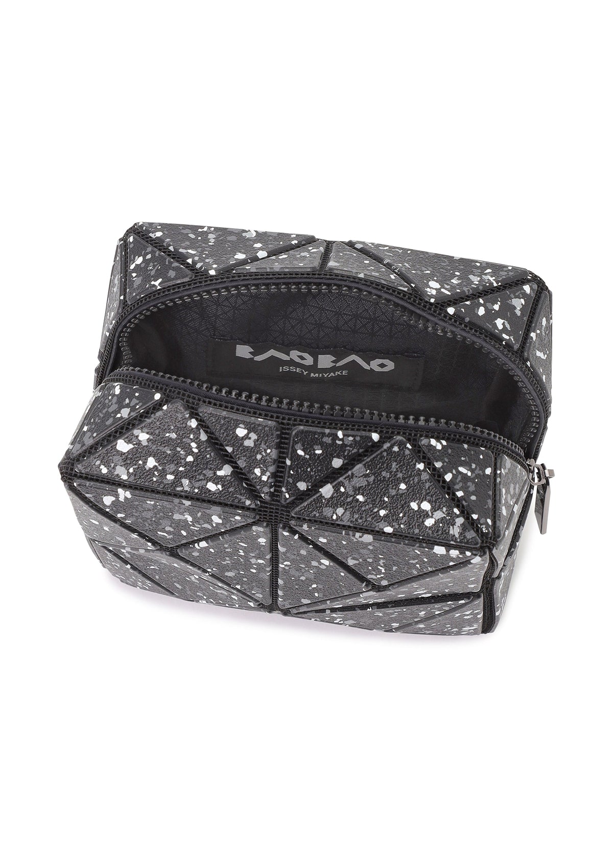 The CITY pouch by BAO BAO ISSEY MIYAKE features a black geometric pattern with white speckles, a sturdy gusset design, and a black interior with a visible brand label. view 8 of 8