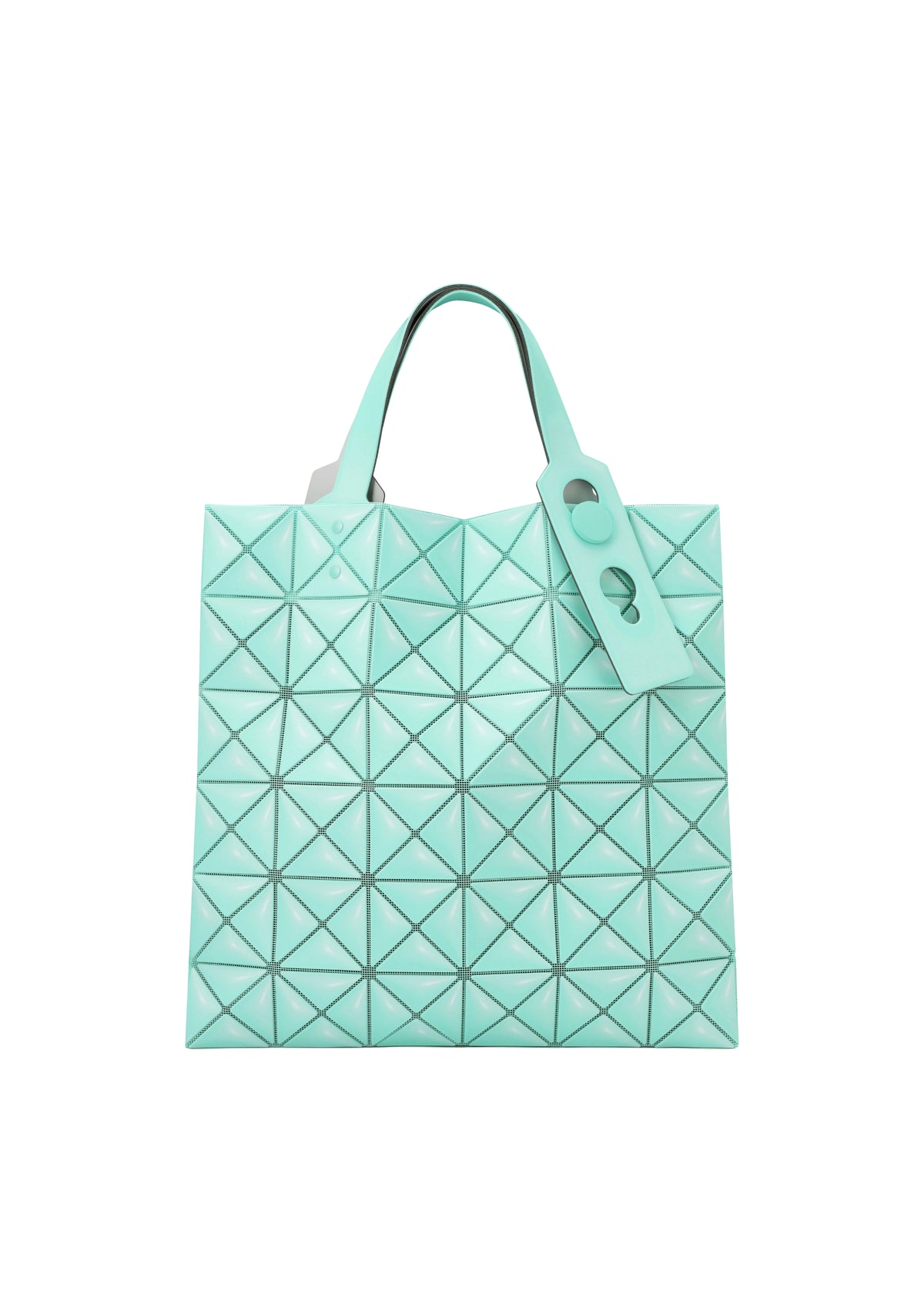 The MINIATURE tote by BAO BAO ISSEY MIYAKE is mint green with geometric triangular patterns, a leather-like finish, two handles with oversized metal hardware, and a matching tag on one handle. view 3 of 9