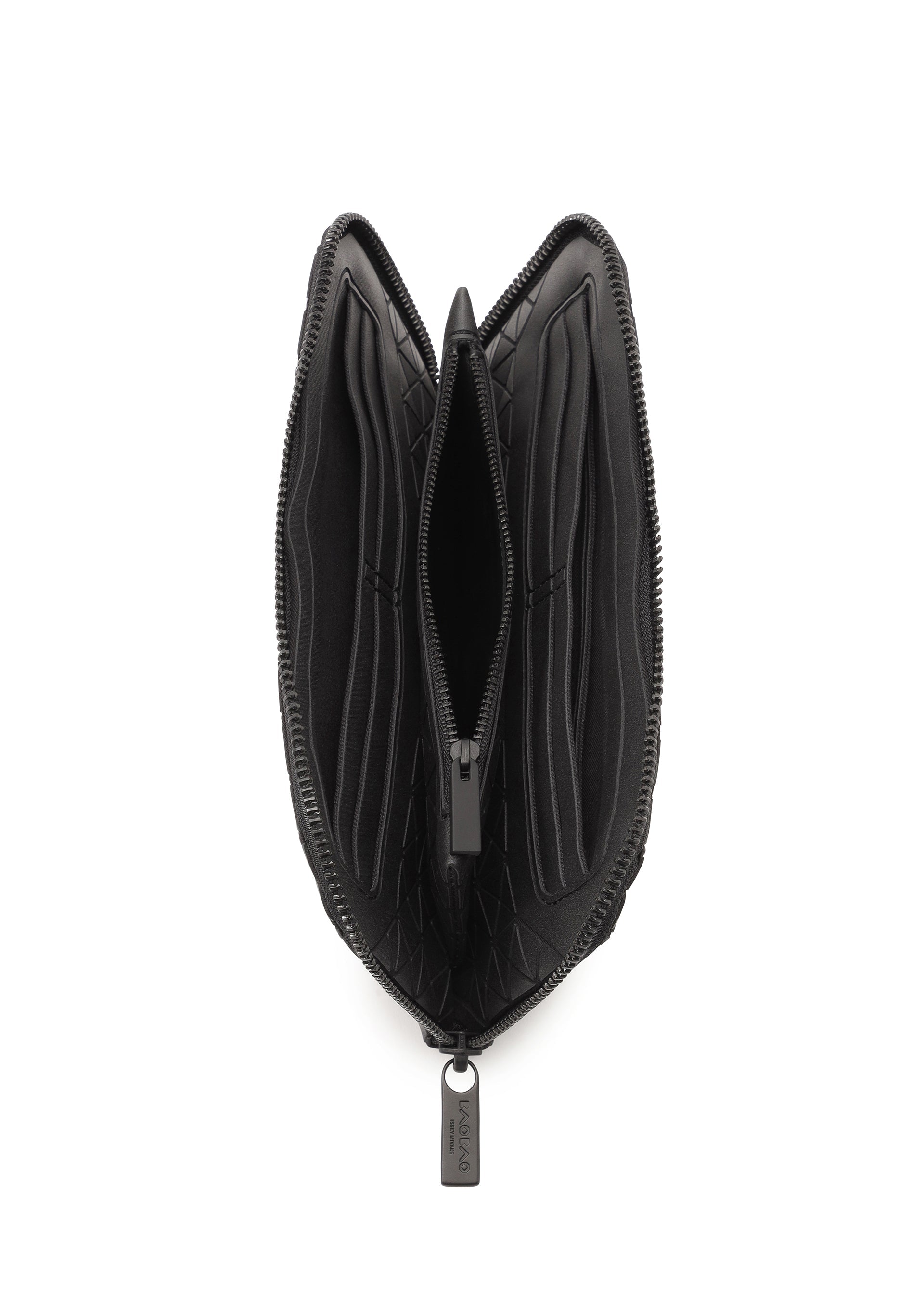 Zoomed view The BOUND wallet by BAO BAO ISSEY MIYAKE is a black zippered design that opens vertically to reveal a symmetrical, organized interior with multiple card slots and a central pocket, all secured by a small rectangular pull tab.